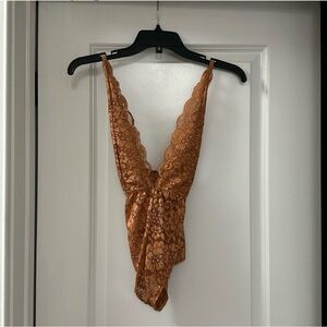 We Are Hah Gold Bodysuit. Size S